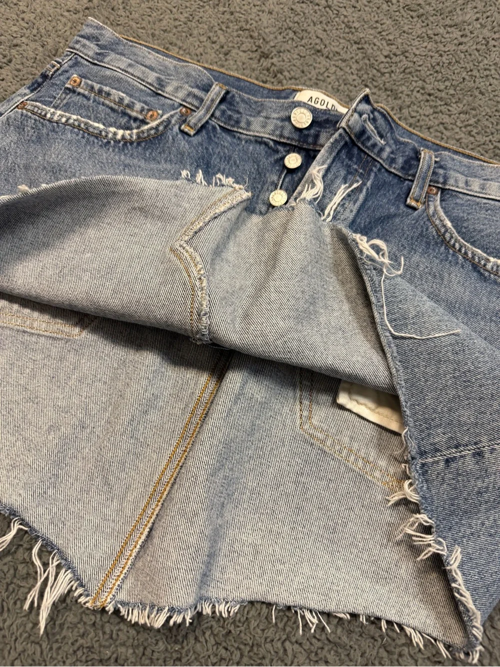 Agolde Light Blue Distressed Button-Front Jean Shorts